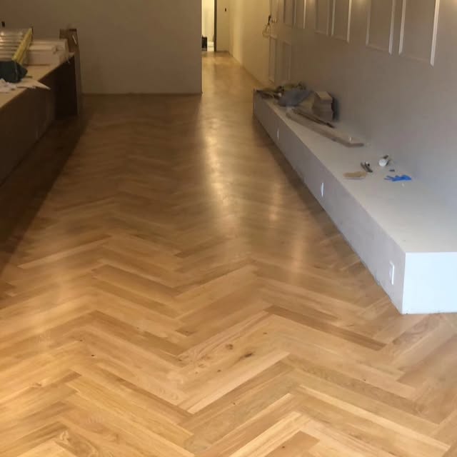 Herringbone hardwood laid in a hallway